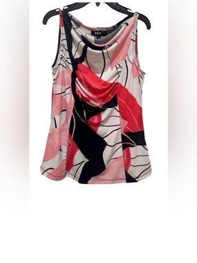 DKNY women’s XS short sleeve white, pink & black blouse with a geometric design